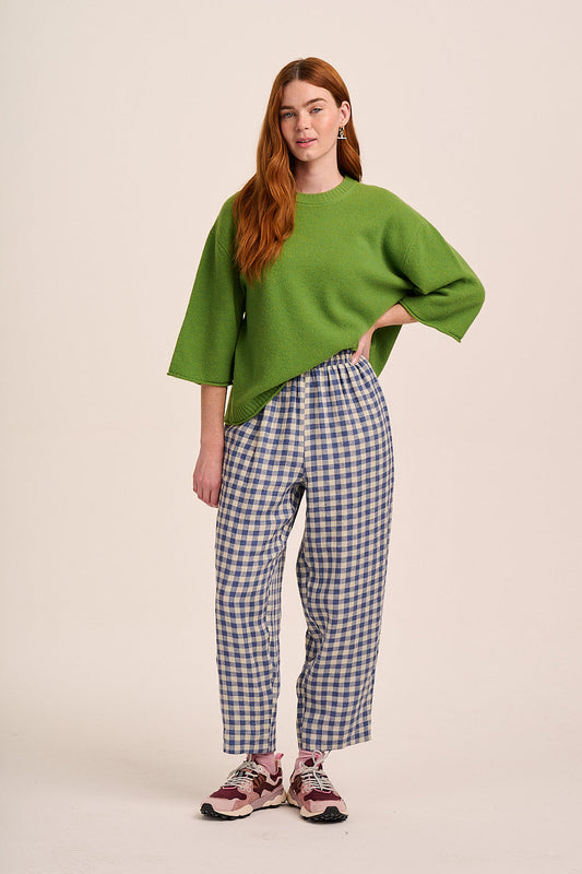 Blue and cream check trousers with elasticated waist, straight leg silhouette, and lightweight woven fabric.