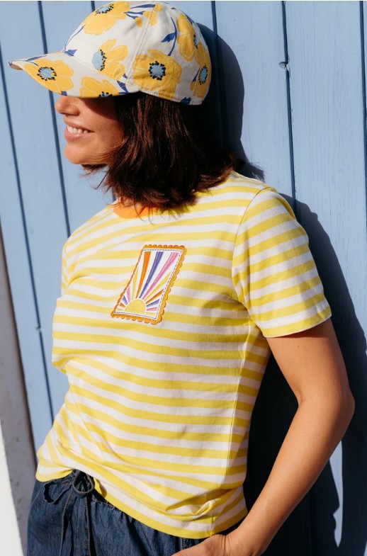 Yellow and white striped organic cotton t-shirt with sunshine motif.