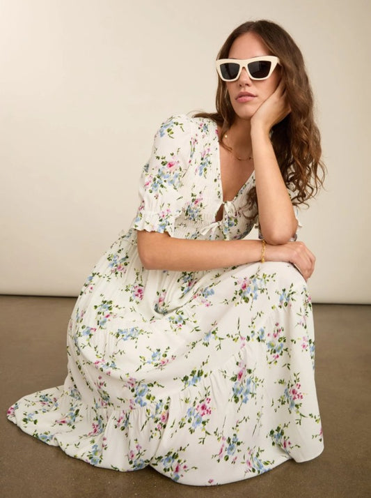 White shirred dress with sprig floral pattern.