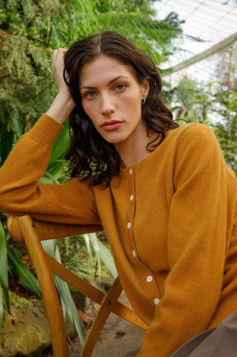 Warm amber cashmere cardigan.