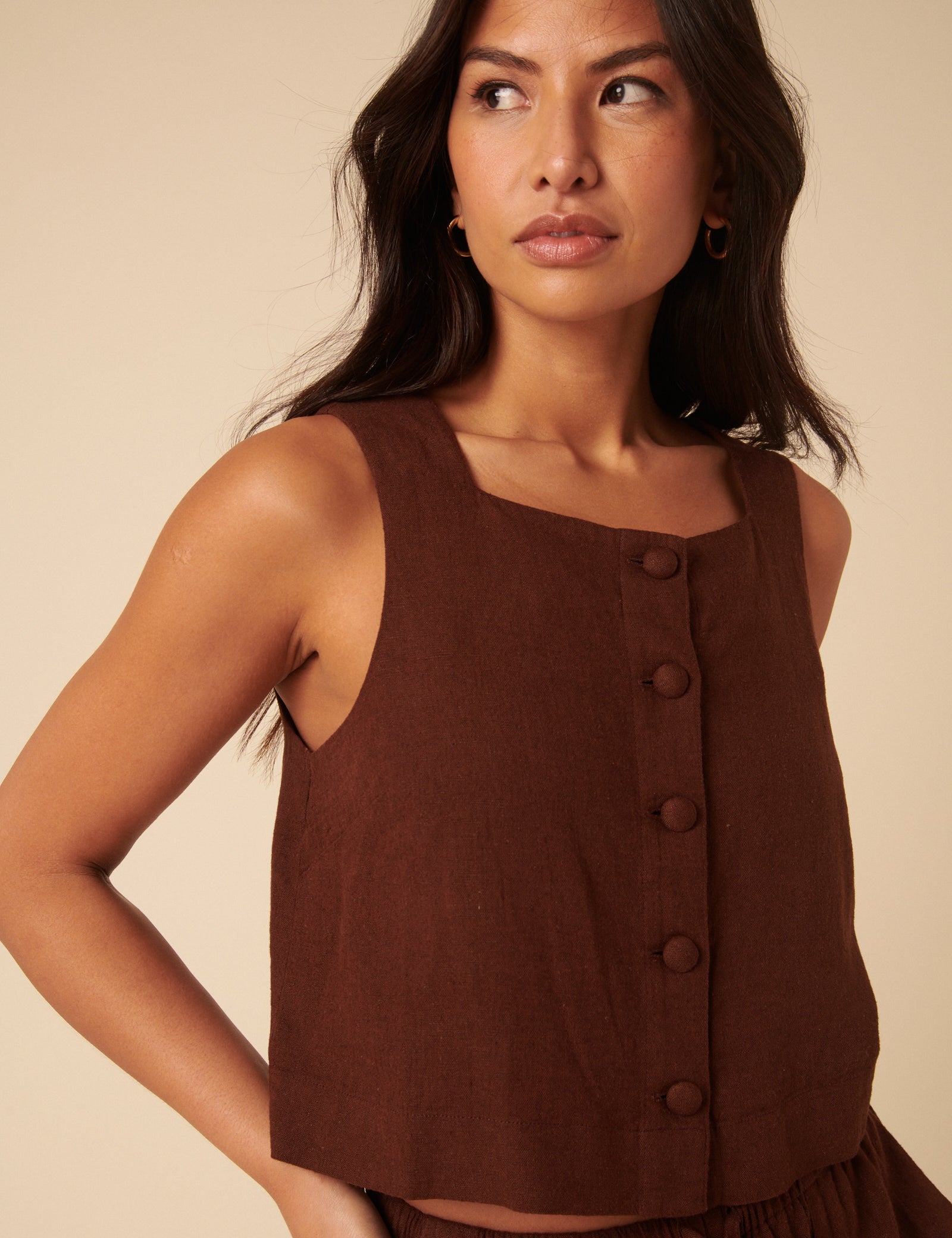 Brown linen blend vest top with buttons.
