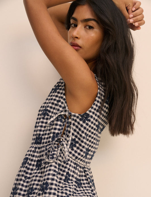 Navy gingham tie-side top.