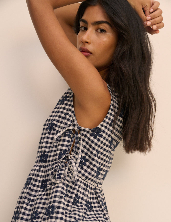 Navy gingham tie-side top.