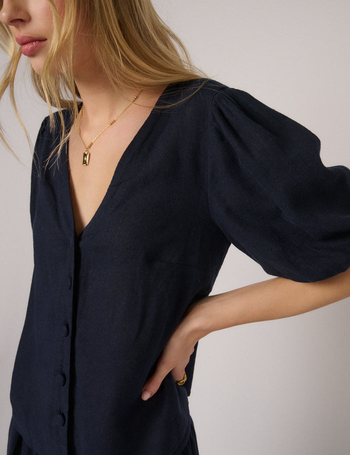 Navy blue linen puff sleeve top.