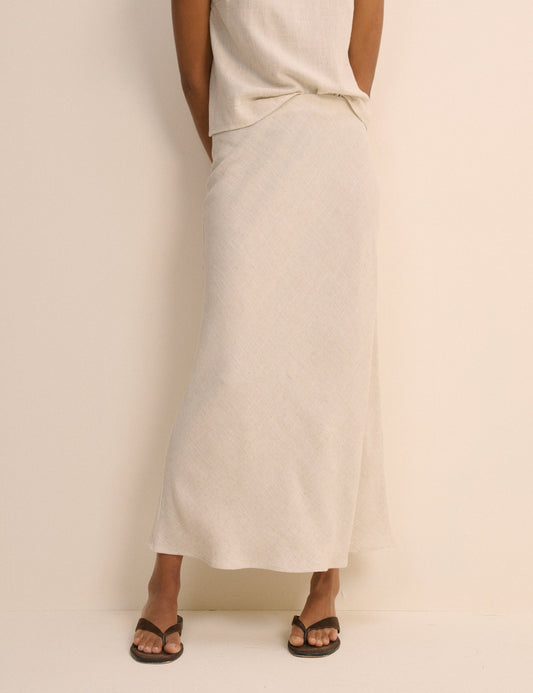 Bias cut linen blend cream midi skirt.