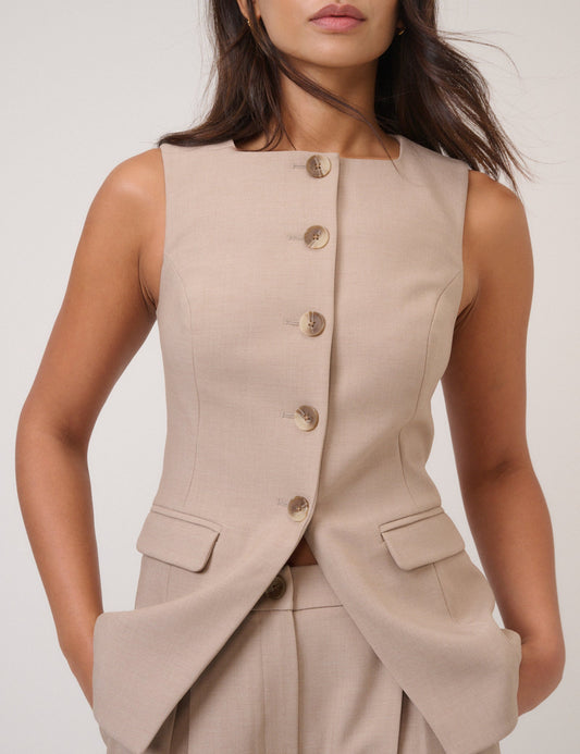 Beige longline button-down waistcoat.