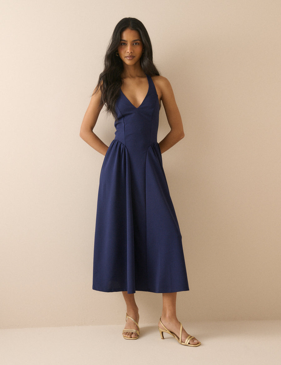 Navy blue halterneck midi dress.