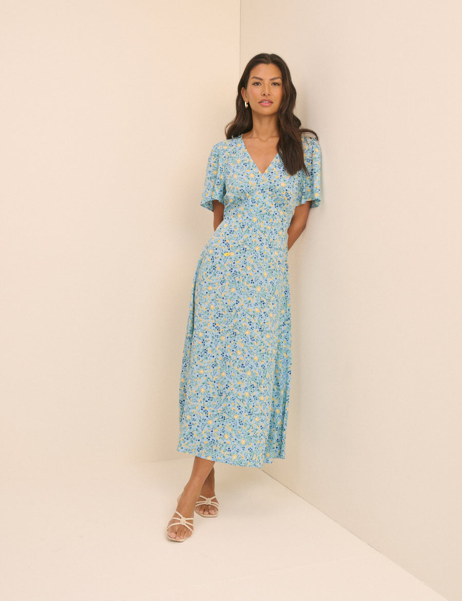 Pale blue and yellow floral midi dress.