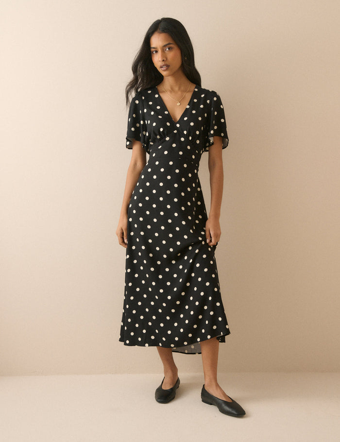 Black and white polka dot midi dress.