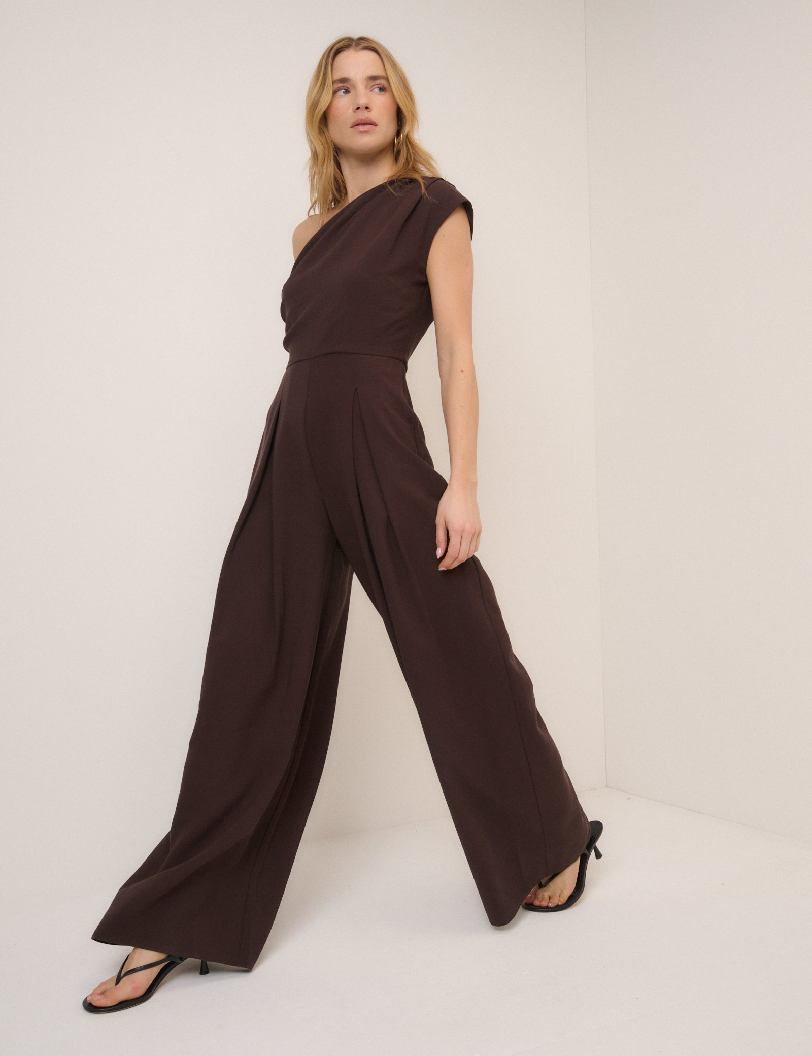 Dark brown one shoulder wide leg jumpsuit.