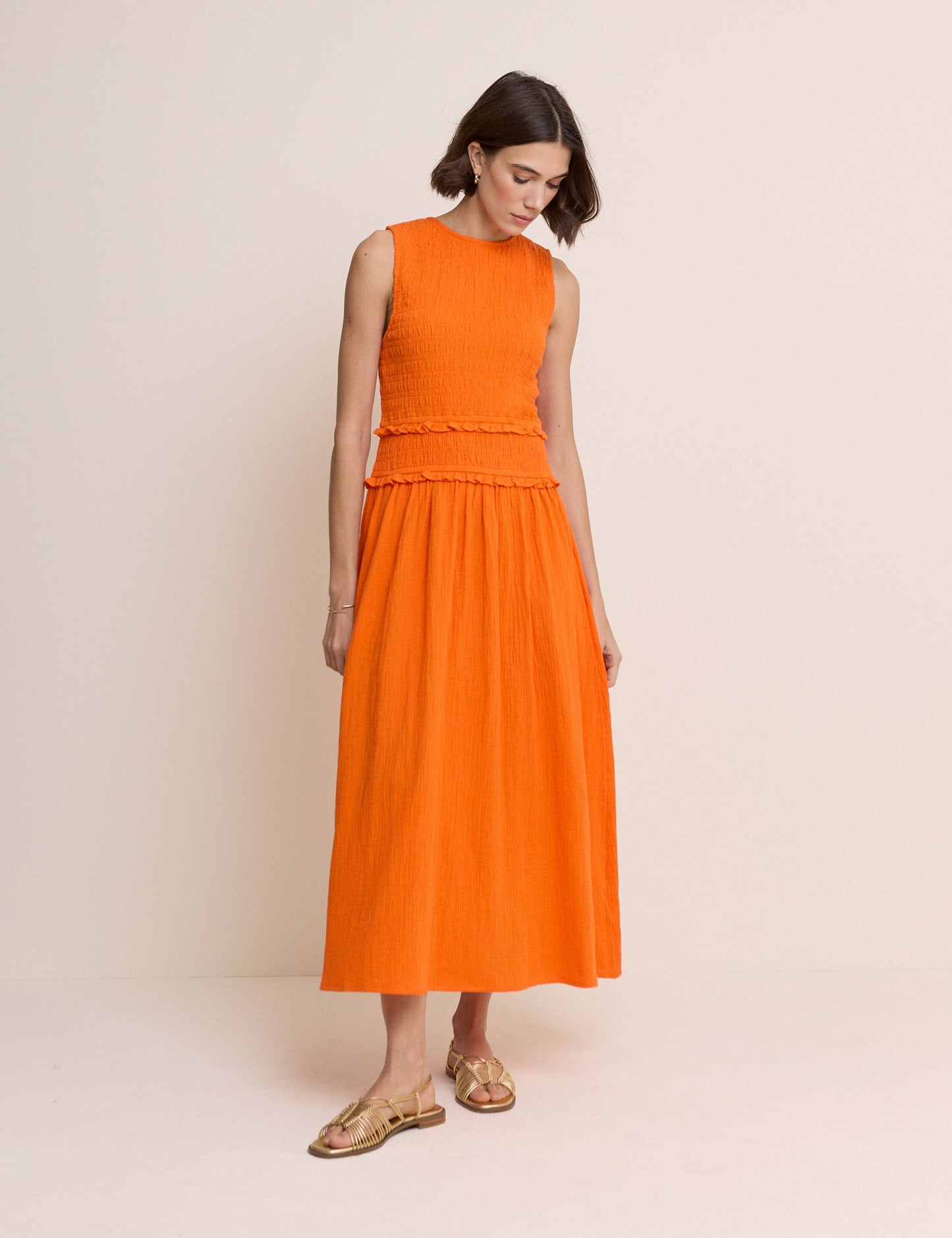 Orange shirred bodice cotton midi dress.