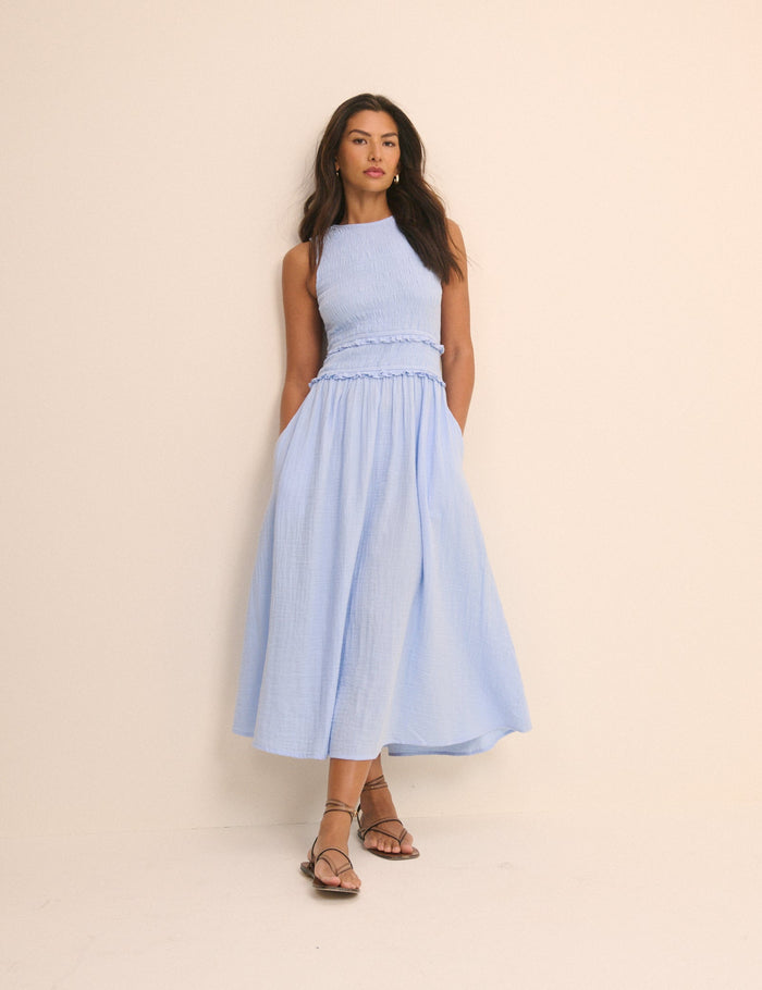 Baby blue shirred organic cotton gauze midi dress.