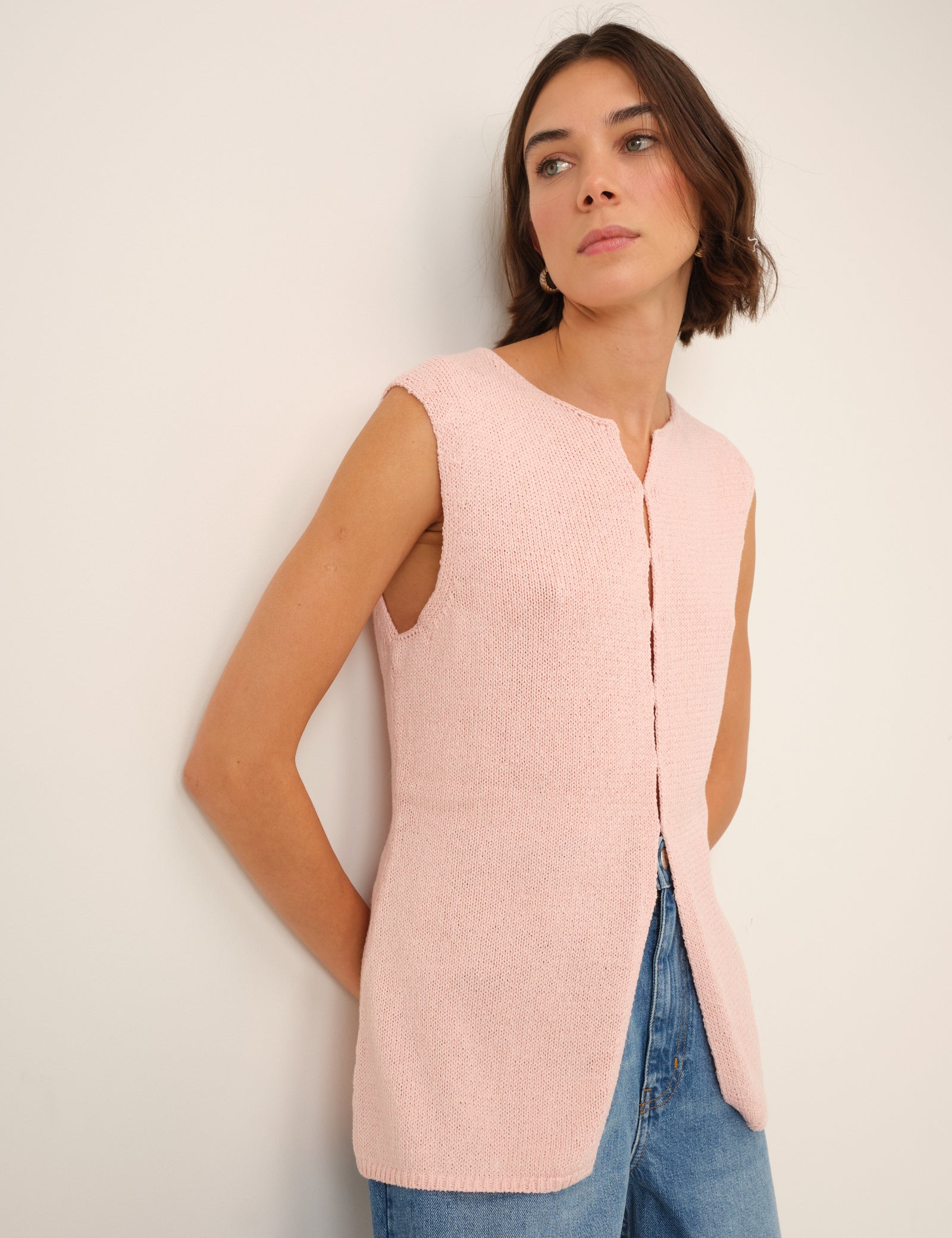 Dusty pink knitted longline waistcoat.
