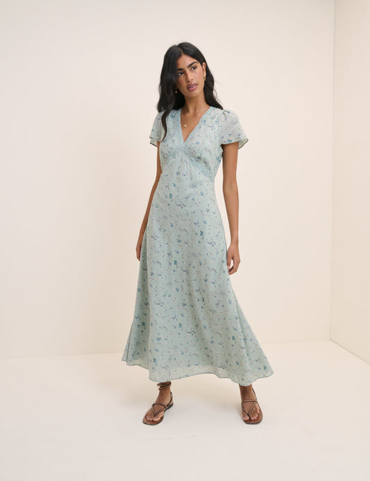 Mint green ditsy floral print midi dress.