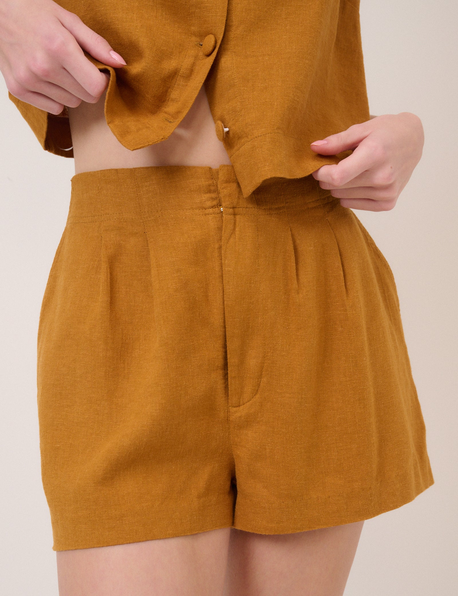 Mustard orange linen shorts.