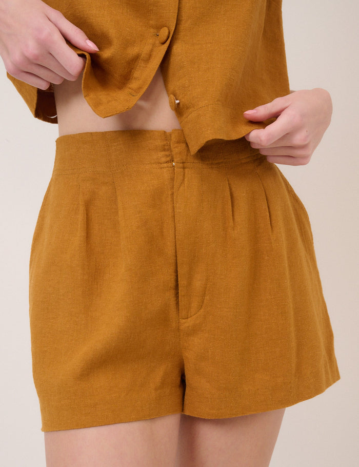 Mustard orange linen shorts.