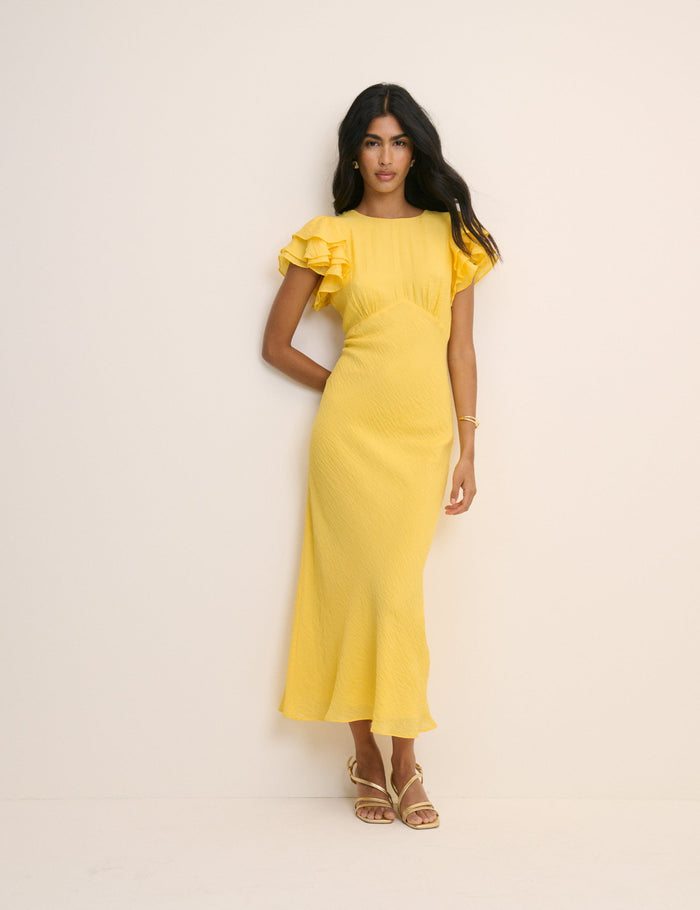 Bright yellow flutter sleeve midi dress.
