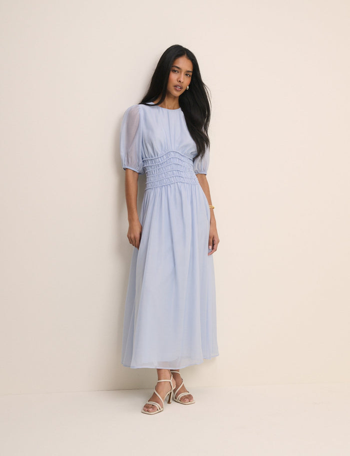Light blue chiffon midi dress.