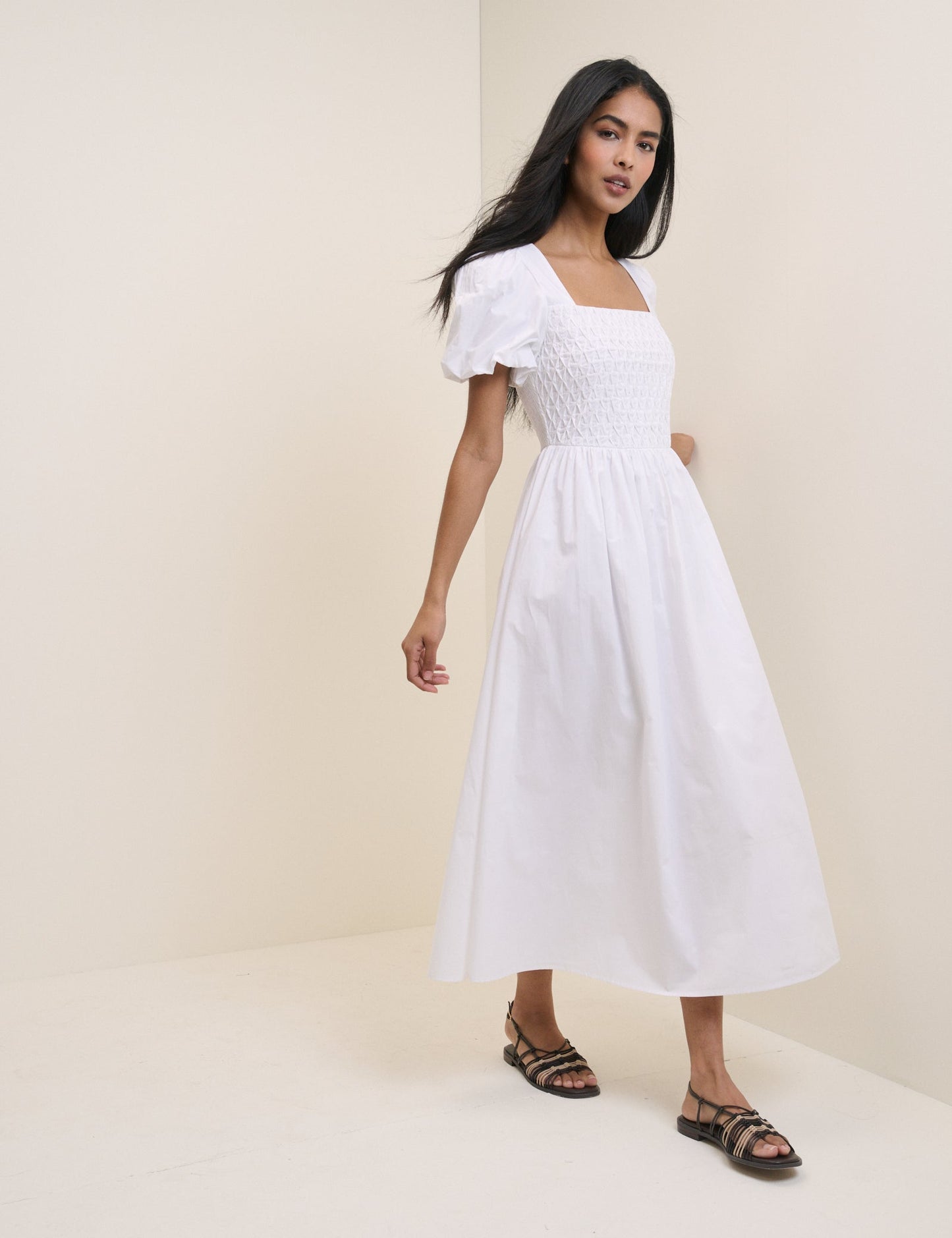 White cotton puff sleeve midi dress.