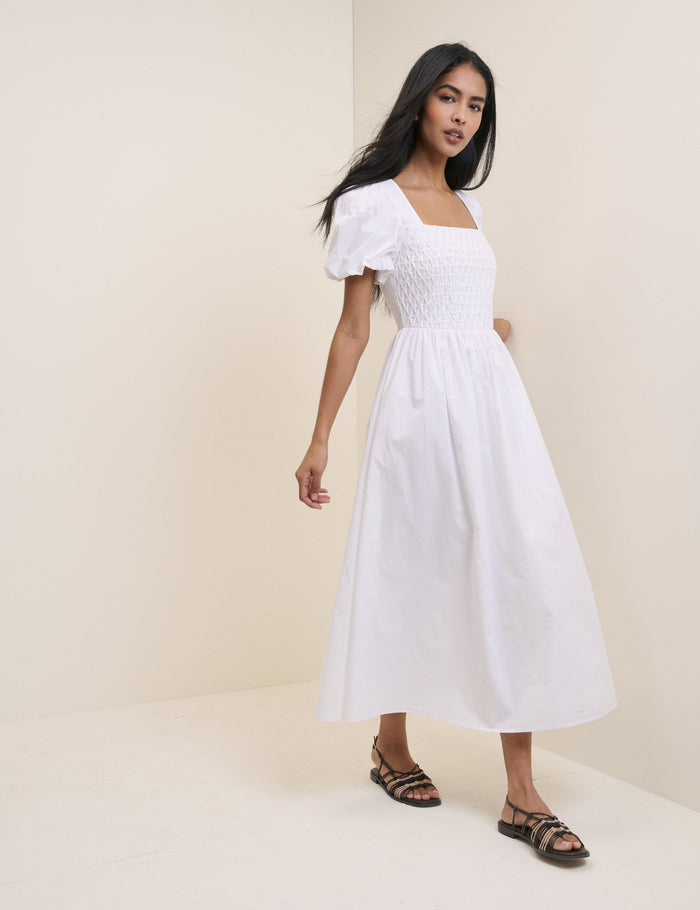 White cotton puff sleeve midi dress.