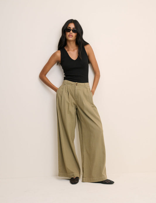 Khaki green high waisted trousers.