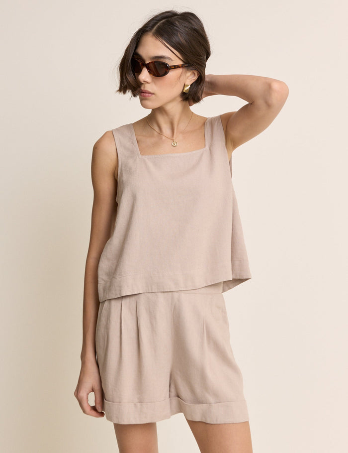Stone beige linen shorts with turn ups.