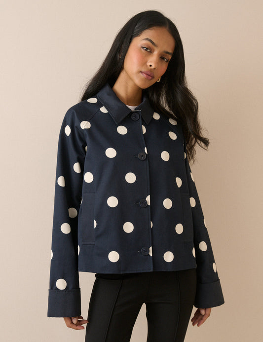 Navy blue polka dot jacket.
