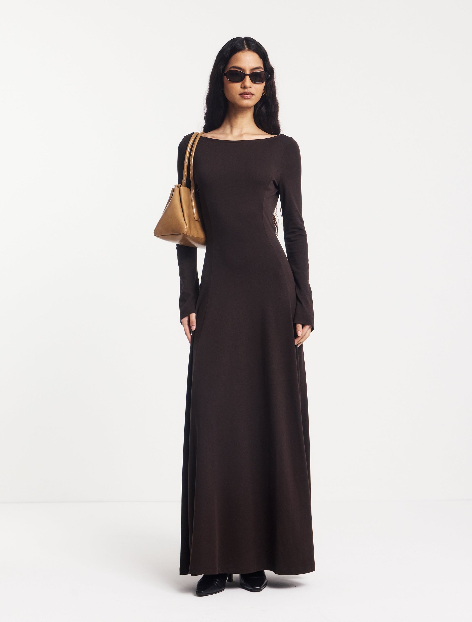 Long-sleeve dark brown maxi dress with scoop back.