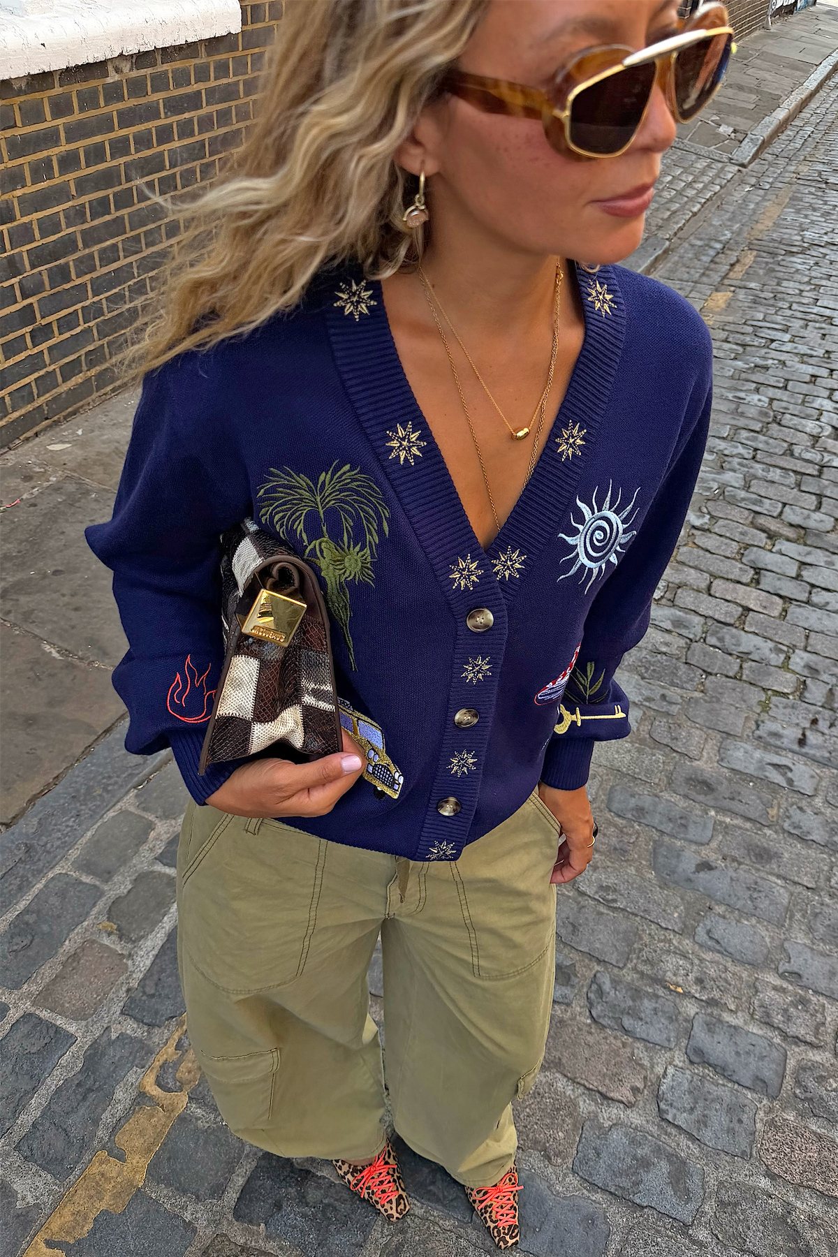 Navy embroidered v-neck cardigan.