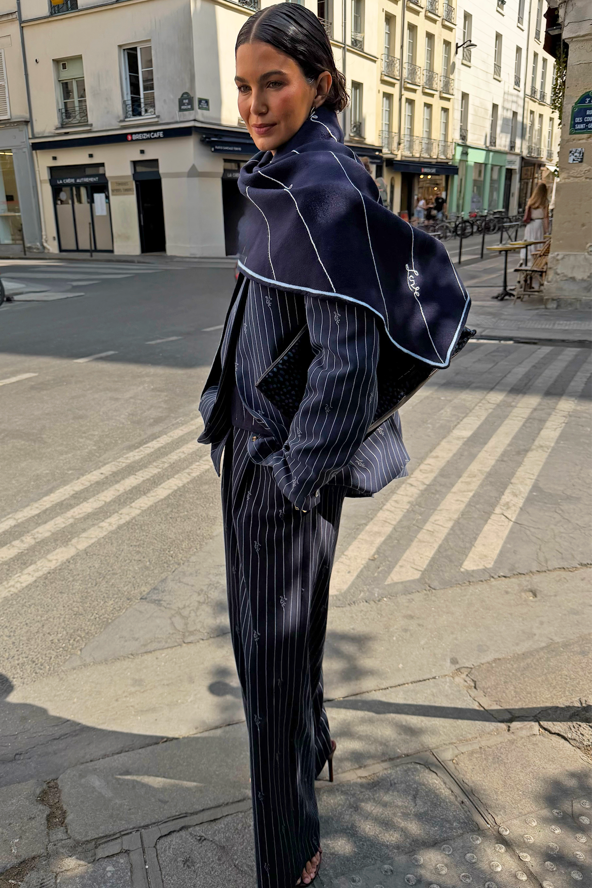 Navy pinstripe knitted triangle scarf.