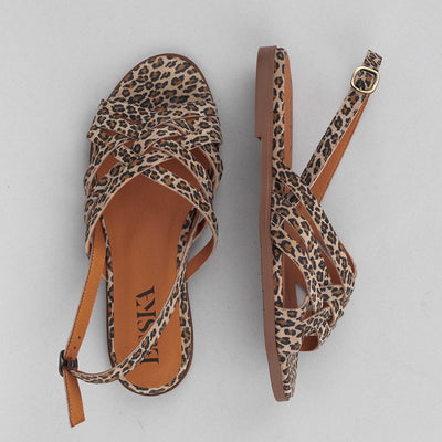 Flat suede leopard print slingback sandals.