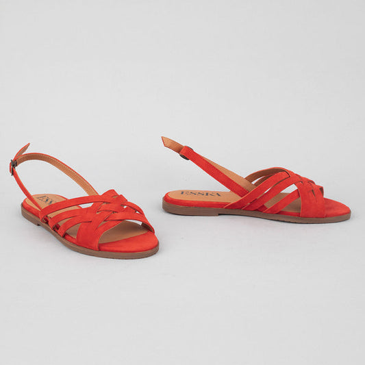 Flat red slingback sandals.