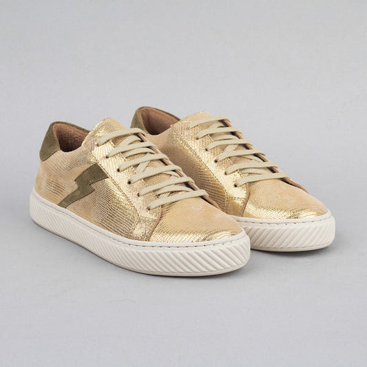 Gold suede trainers with lightning bolt