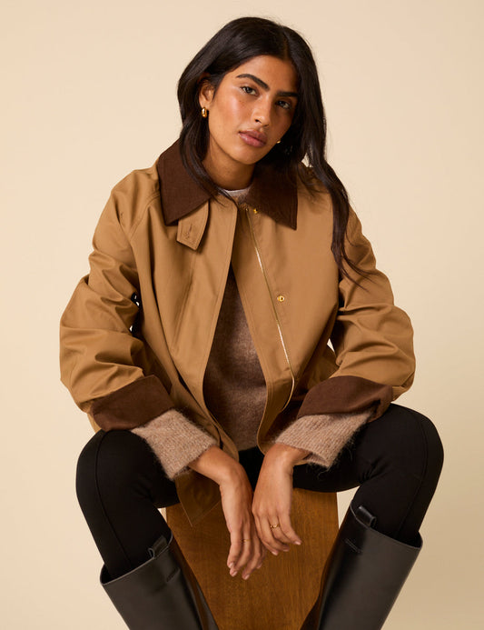 Camel coloured barn jacket with chocolate brown corduroy collar and cuffs.