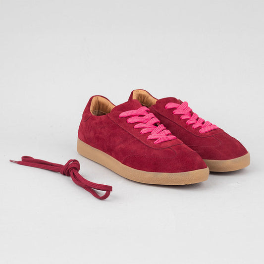 Dark red suede trainers with pink laces