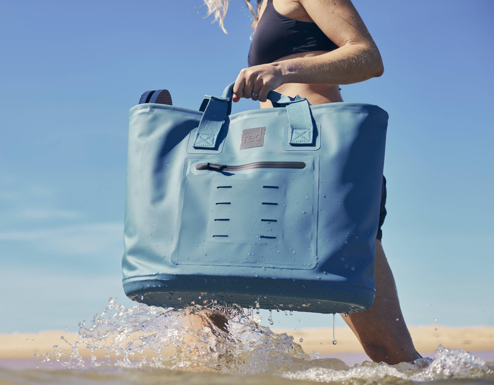 Blue waterproof 33l tote bag.