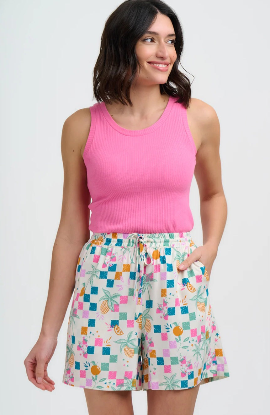 Abstract patterned geometric colourful shorts.
