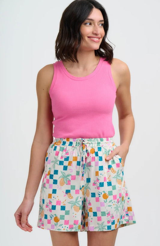 Abstract patterned geometric colourful shorts.