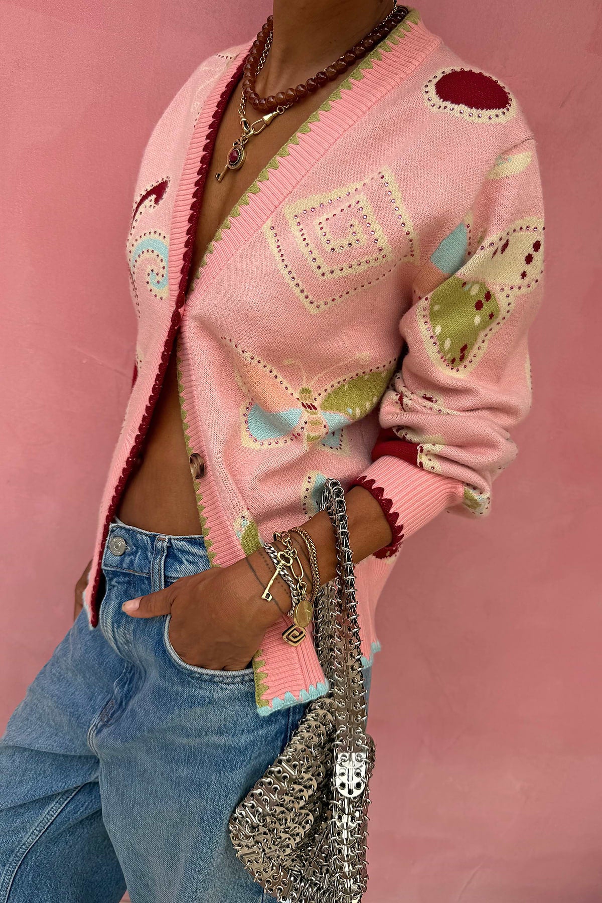 Pink embroidered cardigan.