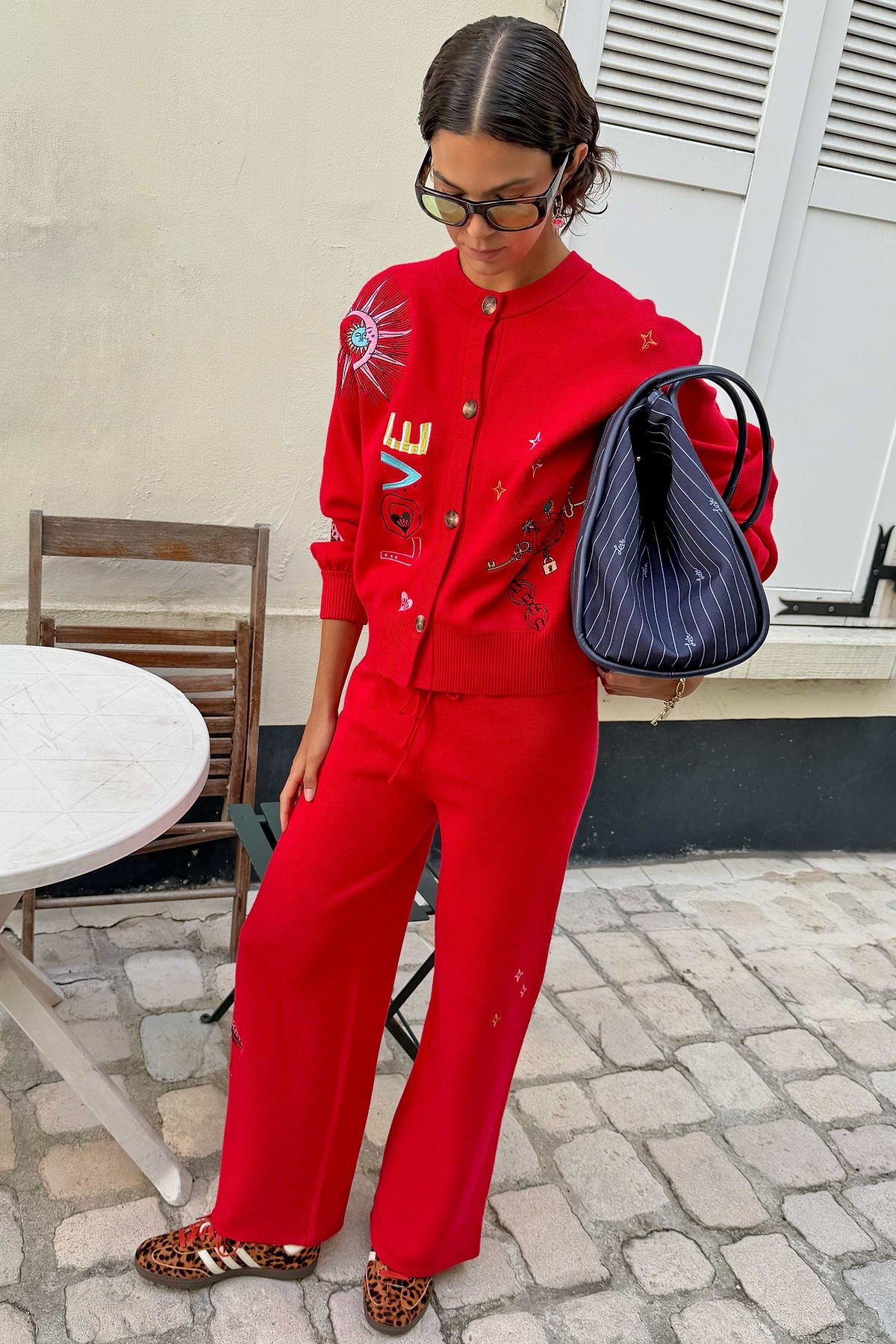 Red wide leg embroidered joggers.