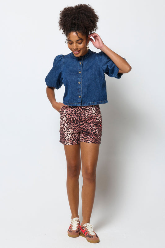 Warm animal print denim shorts.