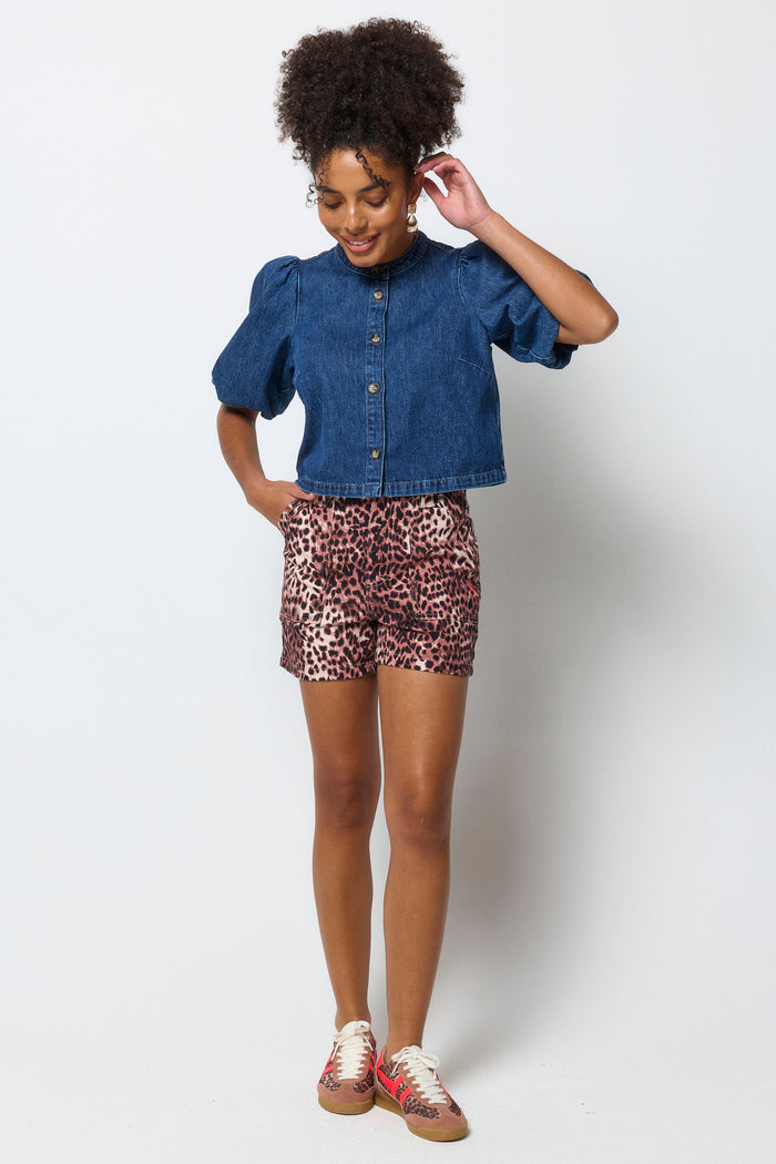 Warm animal print denim shorts.
