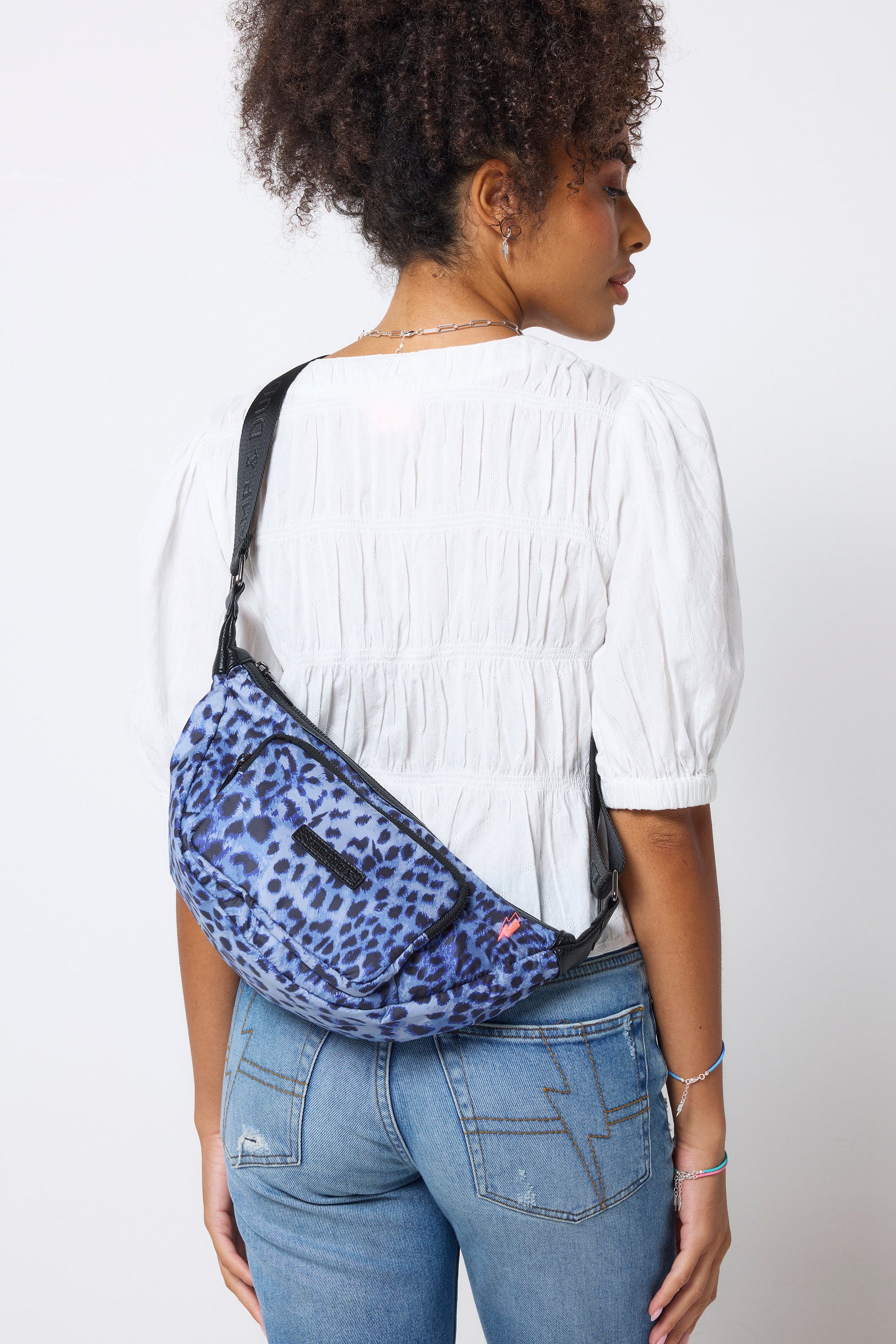 Blue animal print bum bag.