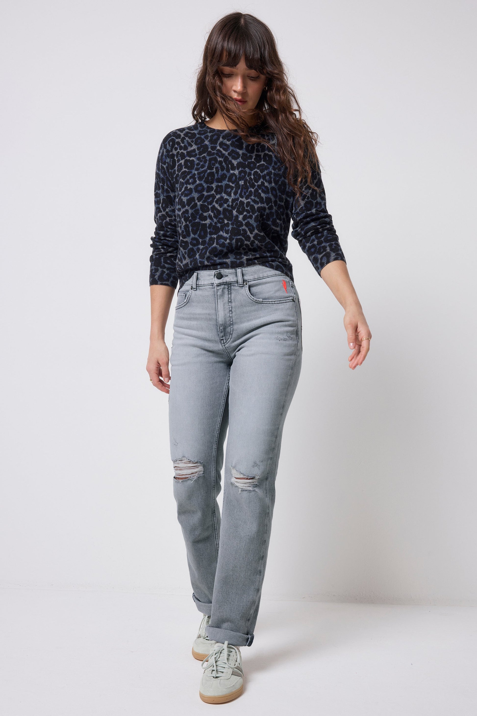 Light grey distressed boyfriend jeans.