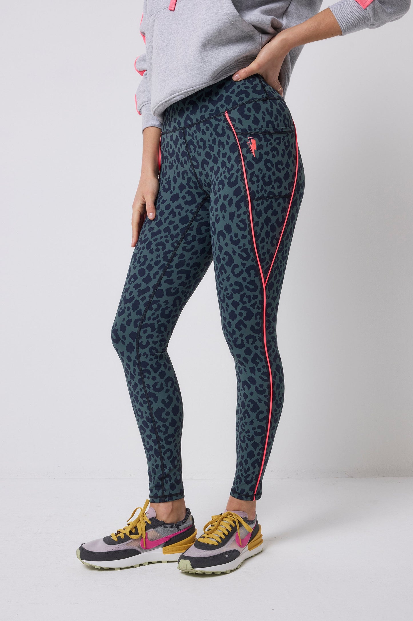 Khaki and navy animal print activewear leggings.