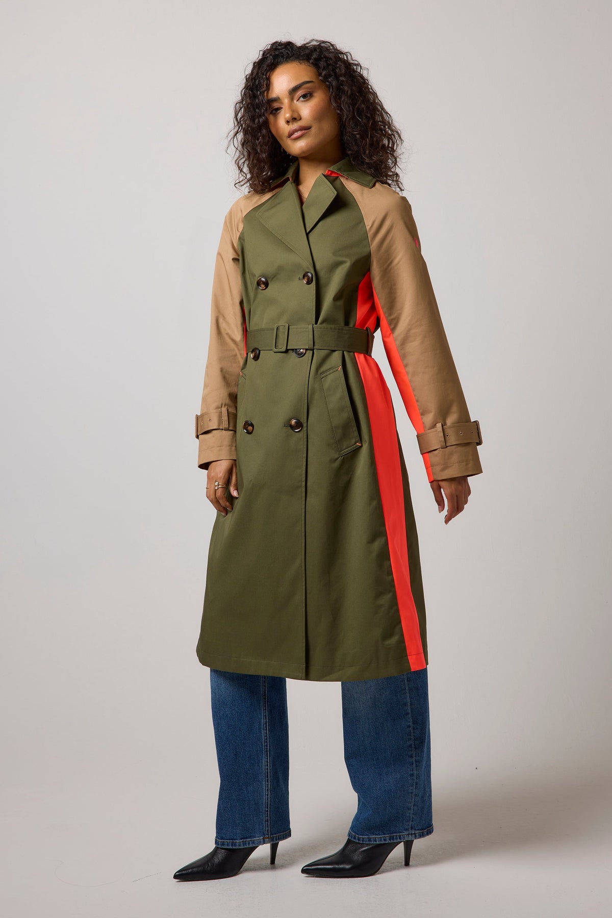 Khaki and camel trench coat with orange stripe.