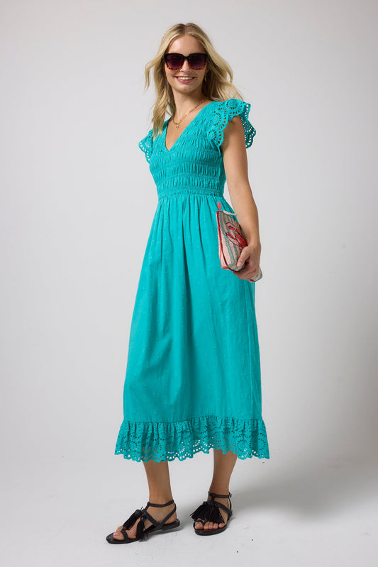 Turquoise shirred bodice midi dress with broderie anglaise detailing.