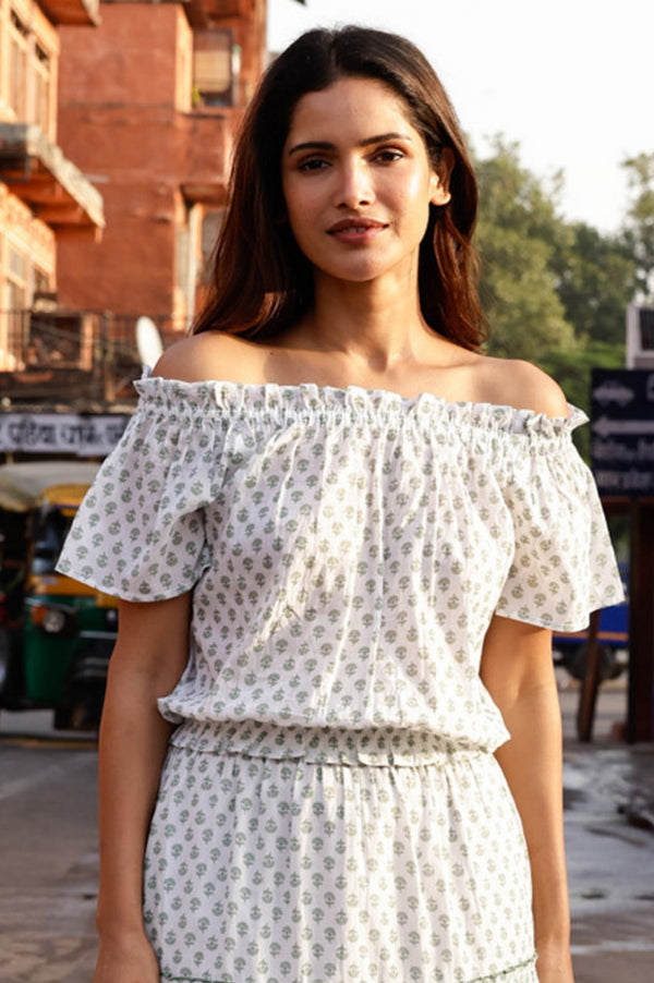 White and sage cotton off-the-shoulder top.