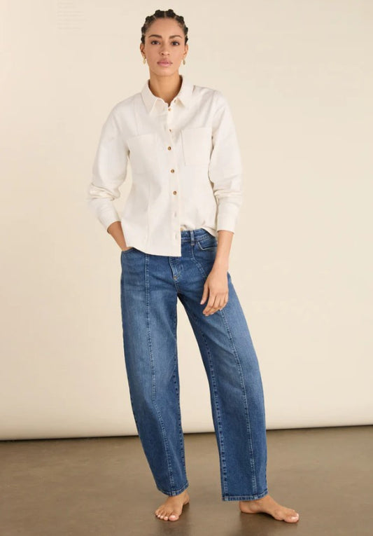 Washed indigo barrel leg jeans in organic cotton by Baukjen.