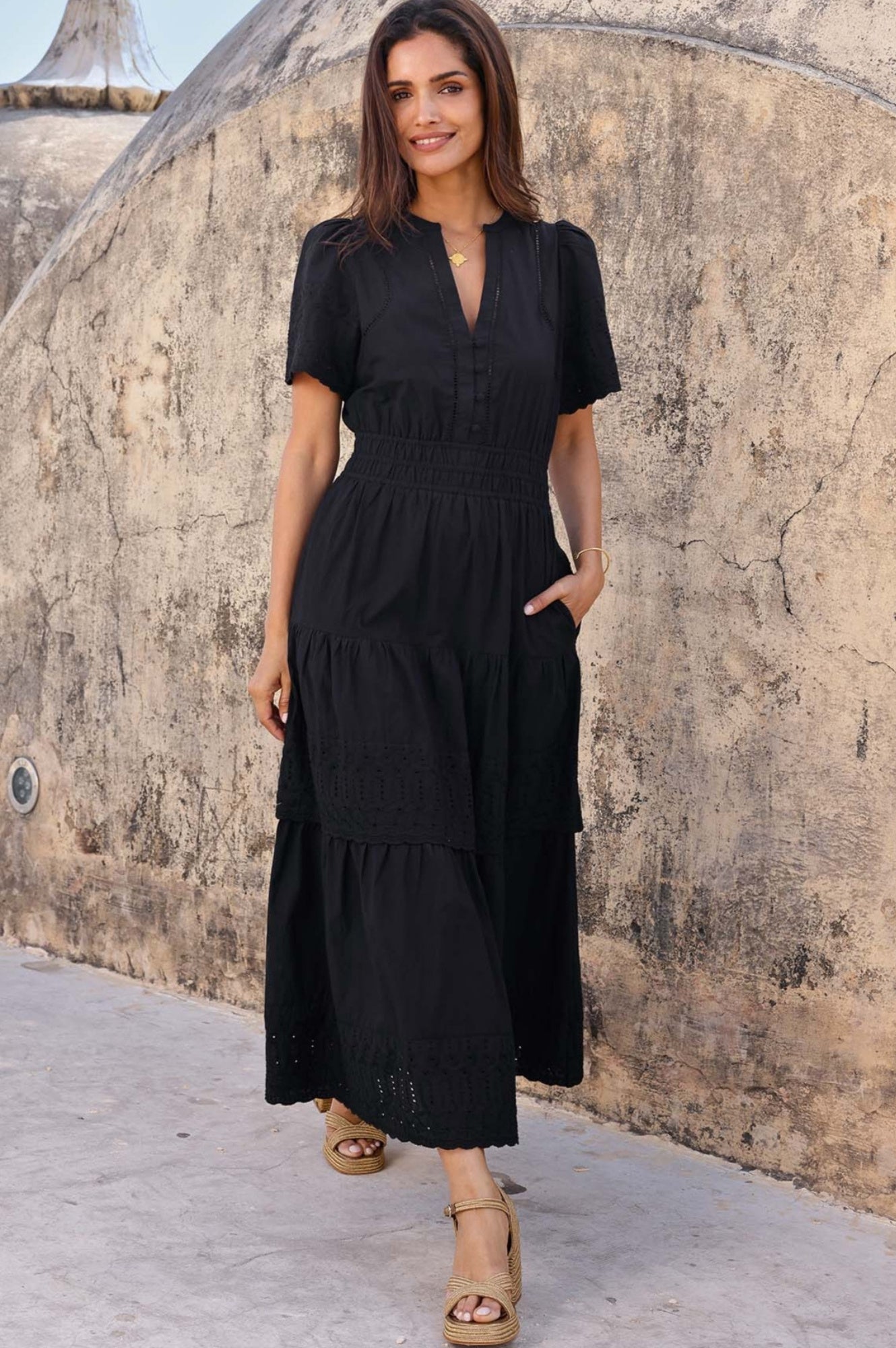 Black short-sleeve broderie anglaise midi dress.